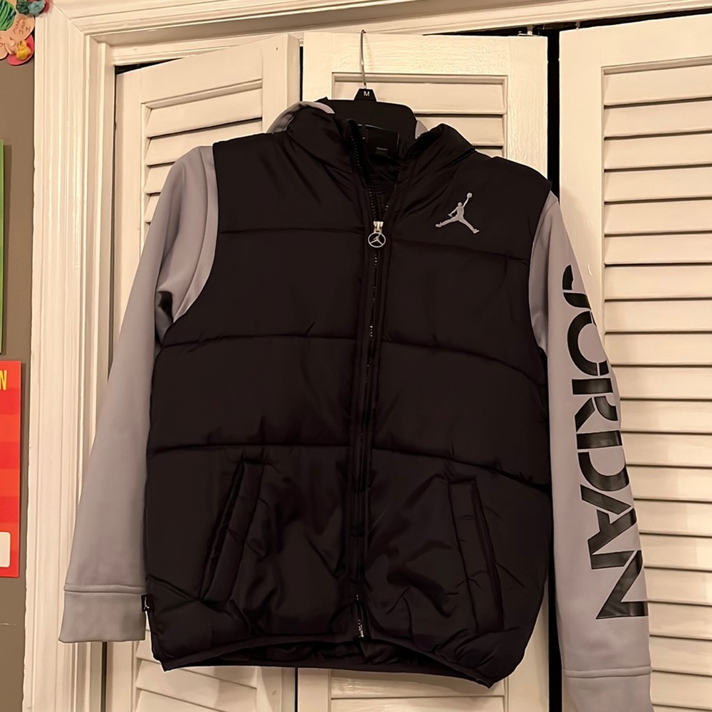 Nike Jordan  puffer vest with fleece sleeves attached.